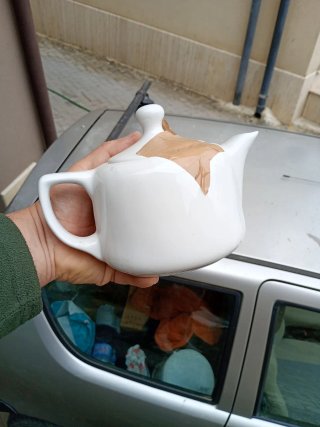 Caraffa per tè/latte in porcellana bianca