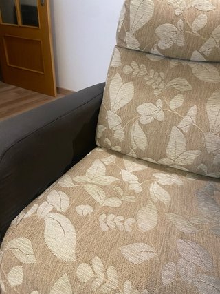 Sillón reclinable beige y negro