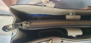 Bolso y cartera Tous beige y dorados