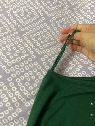 Top monospalla con applicazioni