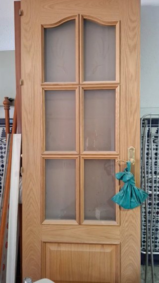 Puerta de interior de madera con cristal