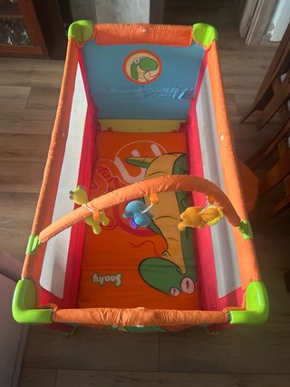 Cuna de viaje naranja