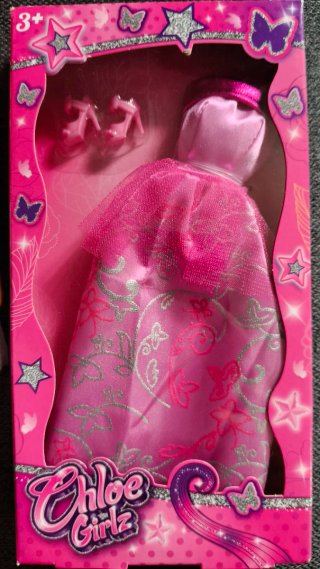 Muñeca Barbie basica con vestido a estrenar