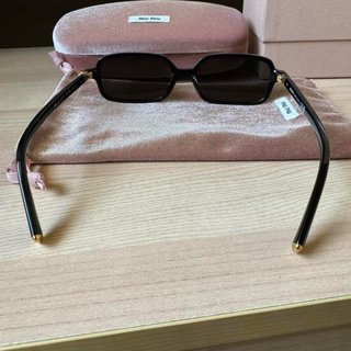 Occhiali da sole Miu Miu Regard neri