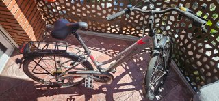 Bicicleta de mujer Kross plateada