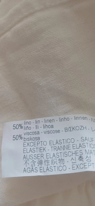 Vestido blanco con volantes y elástico
