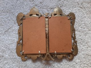Marco doble de bronce antiguo