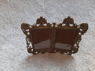 Marco doble de bronce antiguo