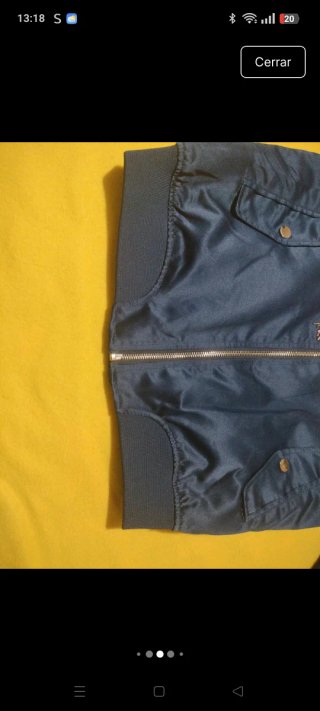 Bomber azul con bordado de grullas y flores