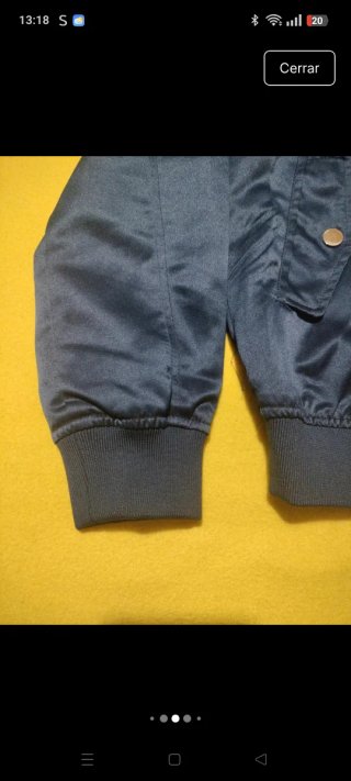 Bomber azul con bordado de grullas y flores