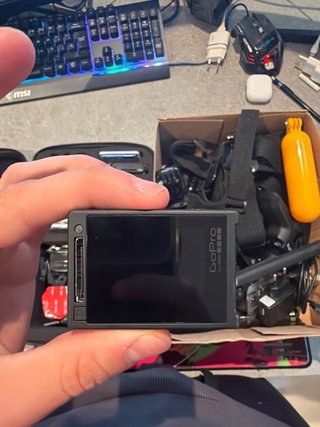 GoPro Hero 4 con pantalla y accesorios