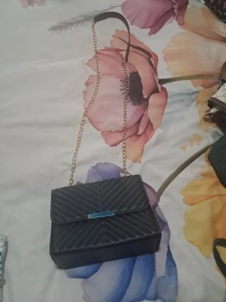 Bolso de fiesta negro y dorado