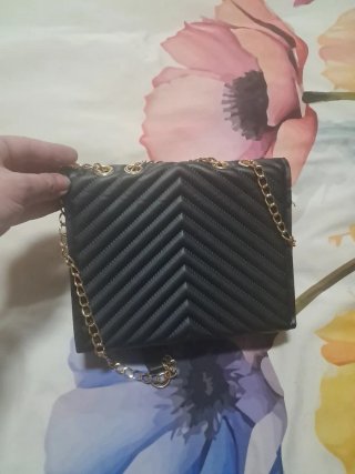 Bolso de fiesta negro y dorado