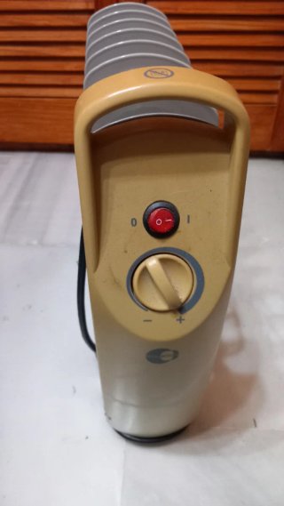 Radiador de aceite gris y amarillo