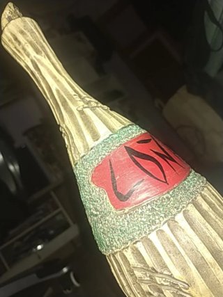 Botella artesanal Vino cerámica y madera