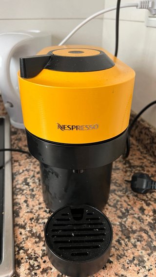 Macchina da caffè Nespresso gialla