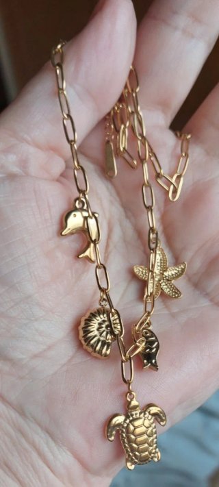 Collar chapado oro con dijes marinos