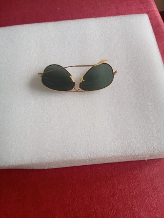 Gafas de sol aviador doradas y verdes