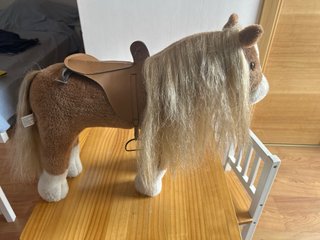 Caballito de juguete con cepillos