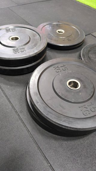 Discos de caucho macizo 15kg y 5kg