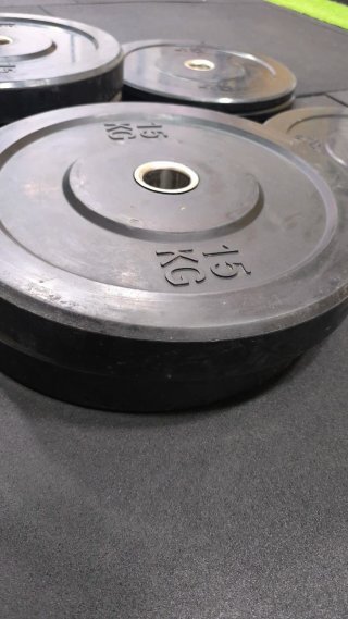 Discos de caucho macizo 15kg y 5kg