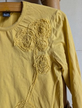 Camiseta amarilla niña manga larga algodón.