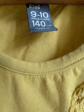 Camiseta amarilla niña manga larga algodón.