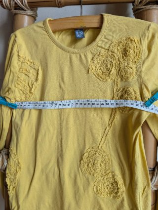 Camiseta amarilla niña manga larga algodón.