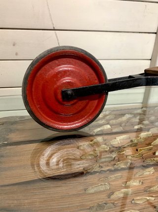 Patinete antiguo de madera y metal