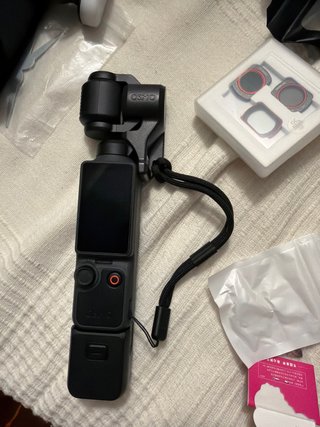 DJI Pocket 4 + Mic Mini 2