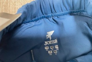 Malla corta running Joma azul y roja
