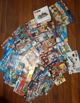 Lotto 11kg di Pezzi Lego + 3kg di Manuali