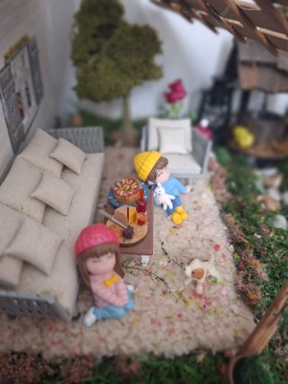 Casa de muñecas con patio