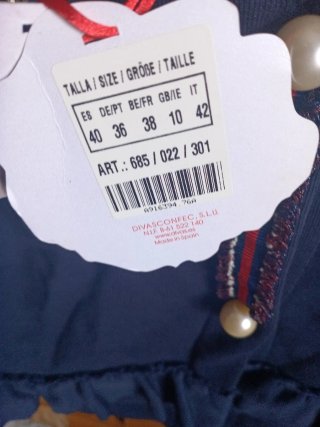 Chaqueta niña con volantes y apliques