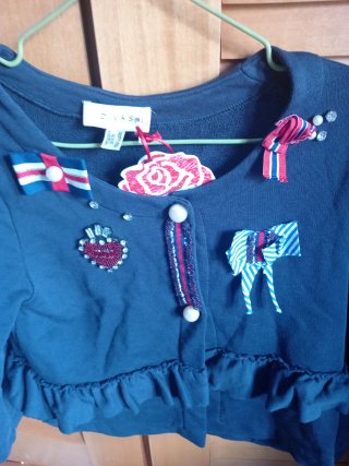 Chaqueta niña con volantes y apliques