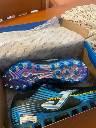 Botas de fútbol Joma Propulsión negras y azules