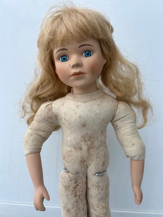 Muñeca de porcelana antigua