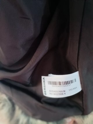 Chaqueta de pelo marrón y gris