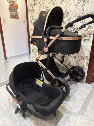 Carrito Bebé Negro y Dorado