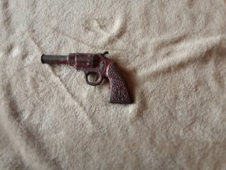Giocattoli Antichi: Pistole e Ascia