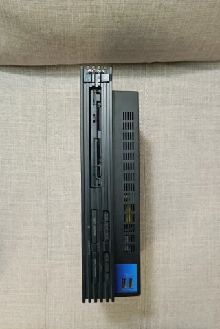 Consola PlayStation 2 con juegos y accesorios