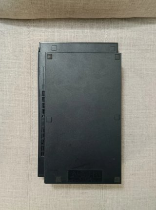 Consola PlayStation 2 con juegos y accesorios