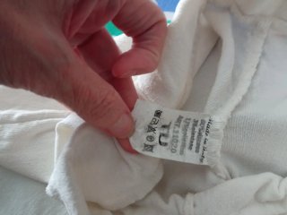 Pantalones blancos acampanados mujer