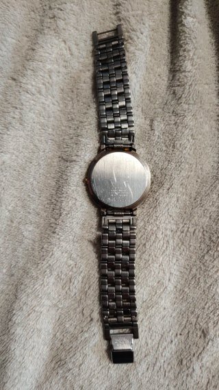Reloj Seiko Quartz Dorado y Plateado