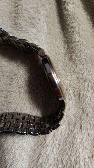 Reloj Seiko Quartz Dorado y Plateado