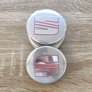 TAPABUJES SEAT 56mm PLATA - EMBLEMA LLANTAS SEAT