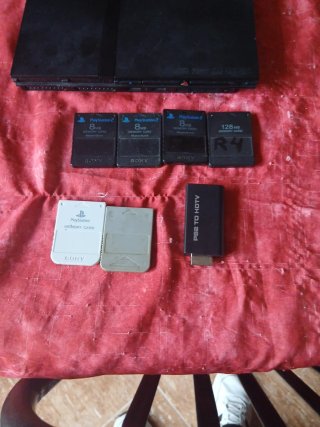 Consola PS2 Slim Negra Sony dos mandos y cables