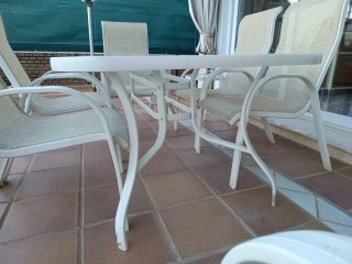 Mesa de cristal y metal para exterior
