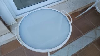 Mesa de cristal y metal para exterior