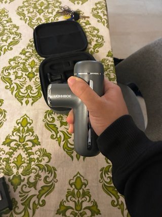 Pistola de masaje